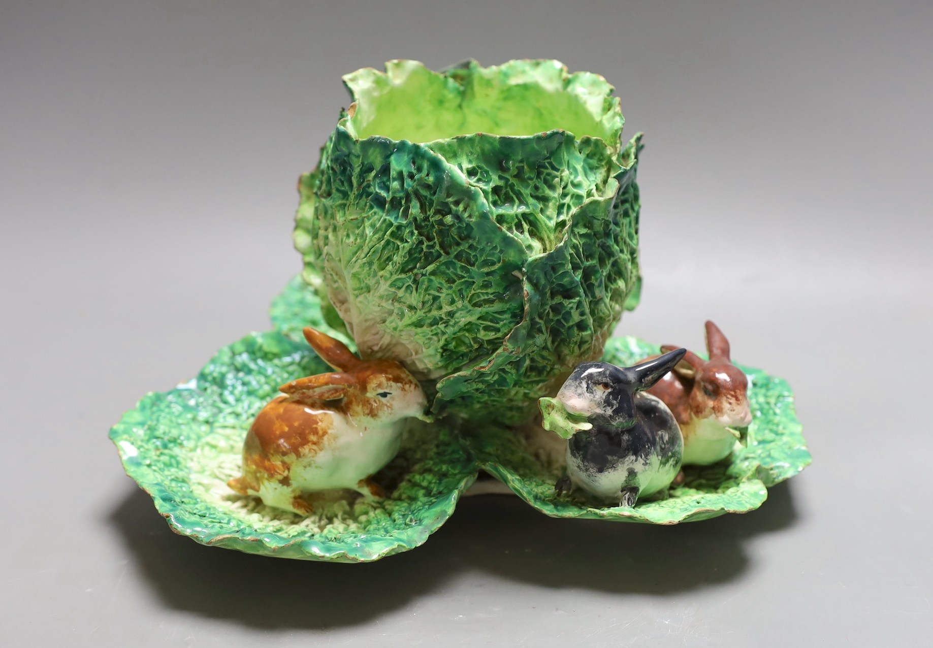 An unusual French earthenware rabbit and cabbage centrepiece. 16.5cm tall